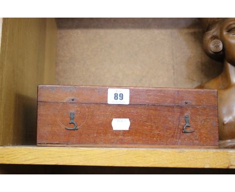 A cased microscope, a set of modern chess pieces and a carved wooden female bust 