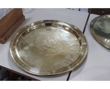 A Victorian mahogany coal scuttle, three brass trays and a ceramic bucket 