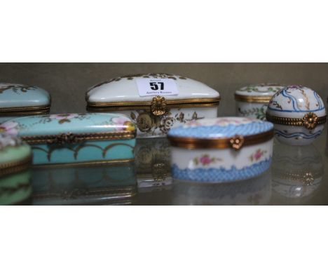 A quantity of enamel trinket boxes, some Limoges 