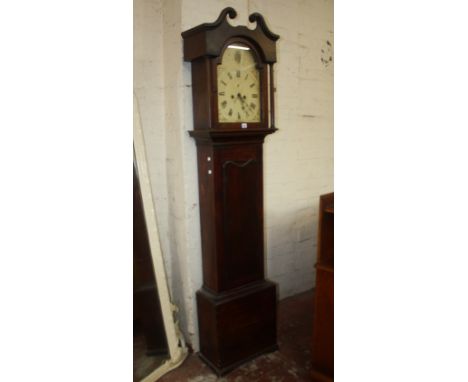 A 19th Century stained pine eight day longcase clock with arched painted dial and subsidiary dial (lacking weights and pendul