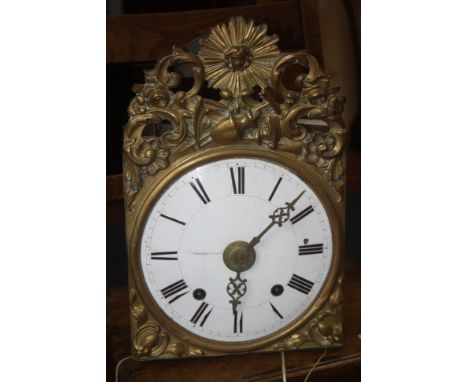 A 19th Century French pine comtoise longcase clock with a brass and enamel dial (a/f) 230cm high 