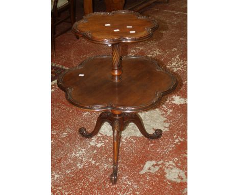 A George III style mahogany two tier piecrust table on tripod base 80cm high, 64cm diameter 