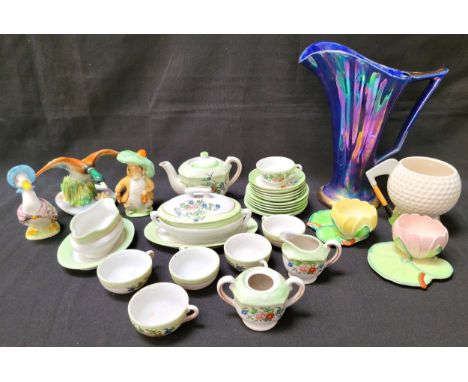 SELECTION OF DECORATIVE CERAMICS including a pair of Carltonware buttercup condiments, a pair of Beswick Beatrix Potter figur