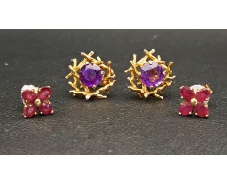 TWO PAIRS OF GEM SET NINE CARAT GOLD EARRINGSone pair set with round cut amethysts within branch/nest effect settings, the ro