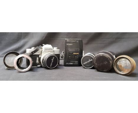 MINOLTA SR T 101 CAMERAwith various lenses including D54KE lens hood, Minolta MC TELE Rokkor-X 135mm 1:2.8 lens in case, a 19