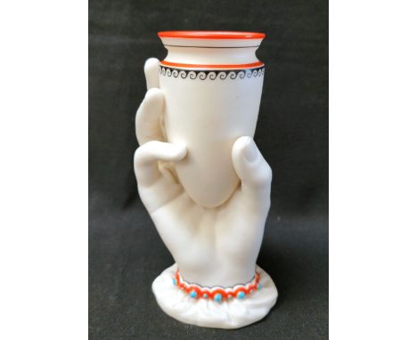 VICTORIAN ROYAL WORCESTER PARIAN "MRS HADLEY'S HAND" BUD VASEin the form of a hand holding a small amphora shaped vase, of un