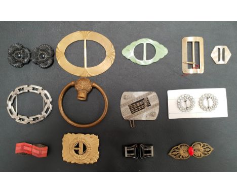 SELECTION OF TWELVE VINTAGE BUCKLESincluding metal, paste set and enamel examples; together with a vintage door knocker
