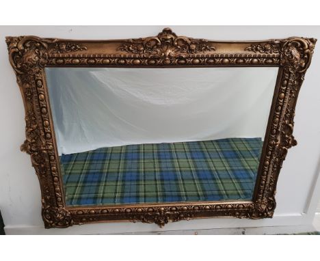 LARGE VINTAGE PEERART WALL MIRRORwith bevel edge, the frame with elaborate moulding of swags and scroll work, 128 x 160cm