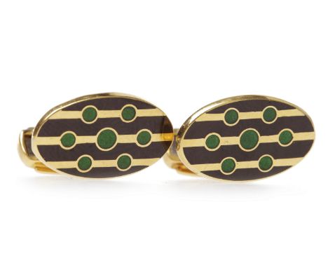 PAIR OF EIGHTEEN CARAT GOLD ENAMELLED CUFF LINKSeach with a panel of oval form decorated with green and black enamel, 12.3g