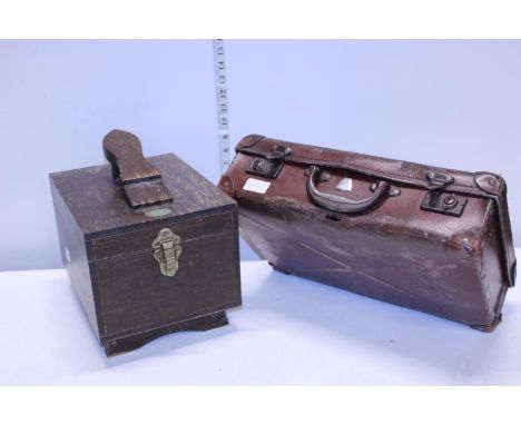 A vintage small suitcase and a shoeshine box 