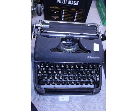 A vintage Olympia Deluxe typewriter. postage unavailable. 