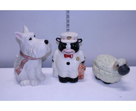 Three assorted ceramic biscuit barrels. postage unavailable. 