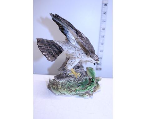 A ceramic figure of eagle by J Byron 