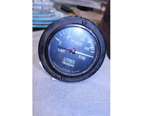 A vintage general motors fuel gauge with float. postage unavailable. 