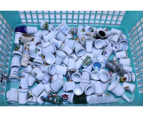 A job lot of assorted ceramic thimbles 