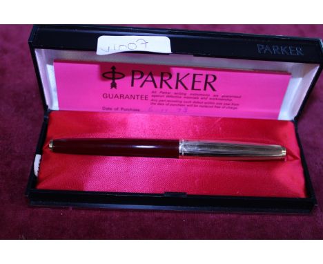 A vintage rolled gold parker fountain pen with a 14ct gold nib 