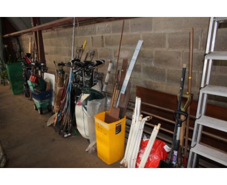 A quantity of metal off-cuts, tools and drain rods