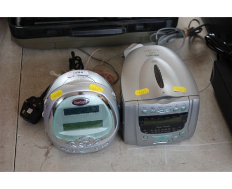 A Goodmans radio alarm clock together with a Roberts CD cube