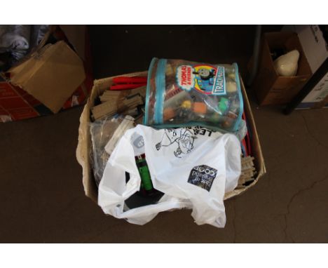 A bag of various Thomas The Tank Engine and other train sets
