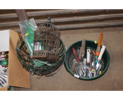 A quantity of hanging planters together with a quantity of various hand tools