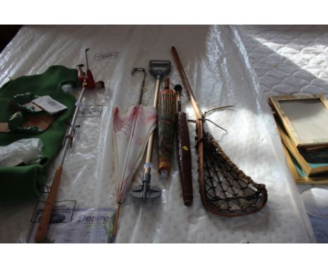 A lacrosse stick; together with various parasols and shooting sticks 