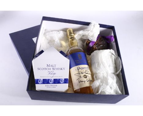 THE SCOTTISH PARLIAMENT gift box containing a bottle of Speyside 12-year-old single malt Scotch whisky with autographs includ
