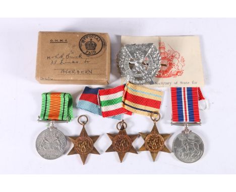 WWII war medals including Defence medal, WWII war medal, Africa star, Italy star and 1939-1945 star, in cardboard issue box a