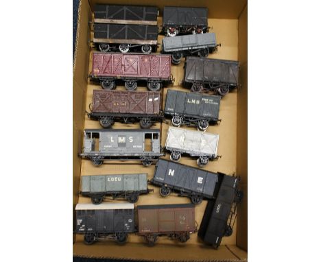 O gauge model railway, a group of twenty three kit built wagons and vans including Baddesley wagon, GWR fruit van, LMS 20 ton