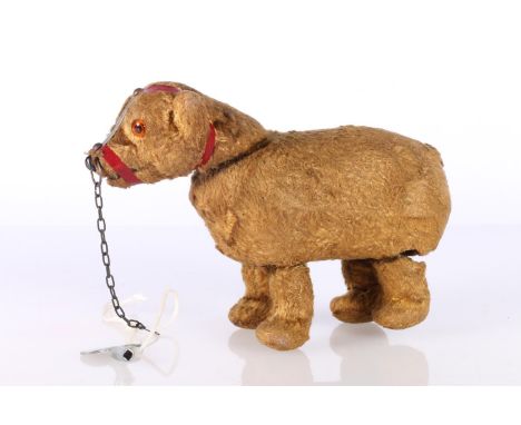 Early 20th century German clockwork model of a walking bear, 15cm long. 