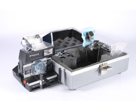 Polaroid Dine Instant Close-up camera model IV, in fitted case with accessories. 