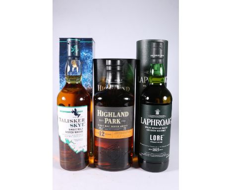 Three bottles of Island single malt Scotch whisky to include LAPHRAOIG Lore 70cl 48% abv. boxed, TALKISKER Skye 70cl 45.8% ab