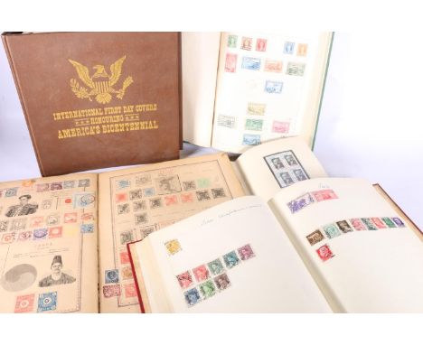 Stamp collection held across five albums including an album of USA International First Day Covers Honouring America's Bicente