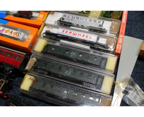 OO gauge model railway accessories including Liliput coaches, ROCO slide tipping wagon and 4340H Biscuits Glaces Migros van, 