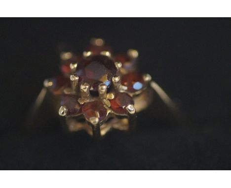 9ct Gold ring set with 9 garnets