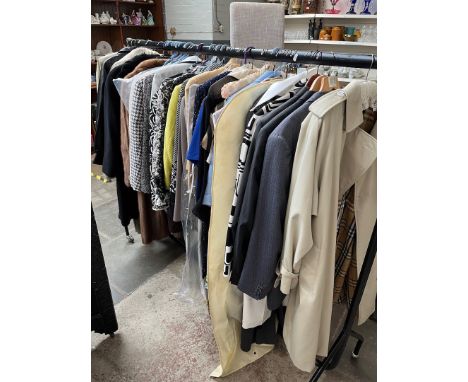 A large selection of vintage clothing, dresses, suits, blouses, etc to include Joseph Ribkoff, Frank Usher, etc together with
