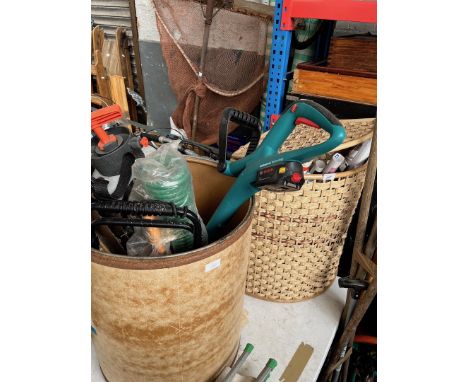 A tub of mixed garden tools including strimmer, sprayer, hose, and a tub of film posters 