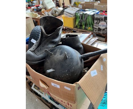 A box of misc metalware and other items including a cast iron cauldron with handle, a Smiths electric brass clock, hobnail bo