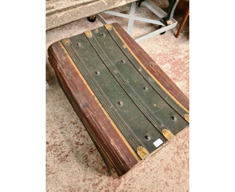 A vintage painted metal travel trunk. 
