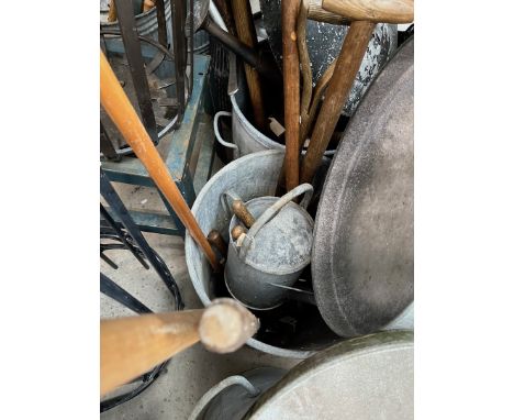 Quantity of garden tools to include galvanised watering  can with rose, garden hand tools, a fork, a spade, a shovel, a garde