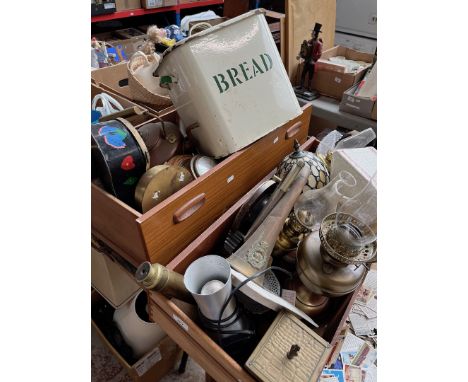 Two drawers of misc. including ship's lamps, clocks, an enamel bread bin, metal wear, a regimental bugle etc. 