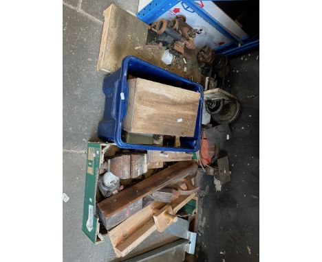 A small lathe on a bed with motor attached, bench grinder, bench engineer's vice, woodworking tools and a box of lathe items.
