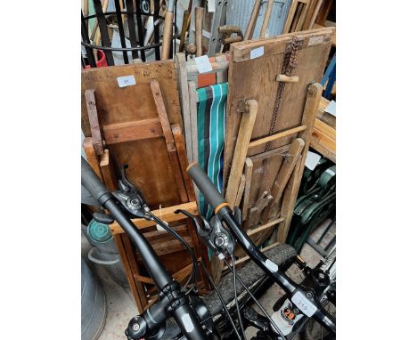2 deck chairs and 2 vintage ironing boards. 