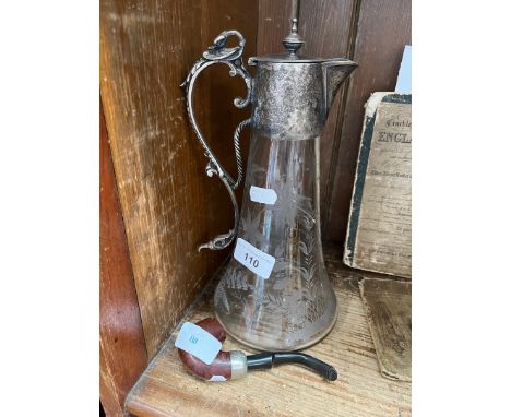 An etched glass claret jug with plated handle and top and a gentleman's pipe by K&amp;P Peterson's. 