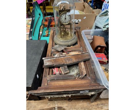 A brass clock under glass dome and a wooden cased wall clock - ( both as found ). 