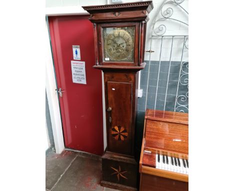 A Georgian oak long case clock, 10 3/4" brass dial signed 'I Bevan Montgomery', eight day movement striking on single bell, w