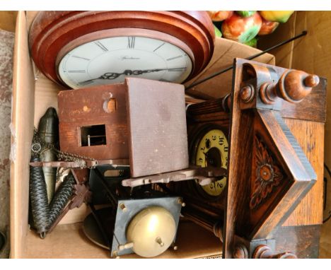 Assorted clocks including a German architectural mantle clock, a reproduction skeleton clock, a wall clock and a cuckoo clock