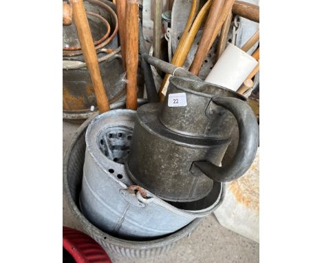 Long reach galvanised watering can, a galvanised mop bucket and a selection of garden tools, spade, fork, etc. 