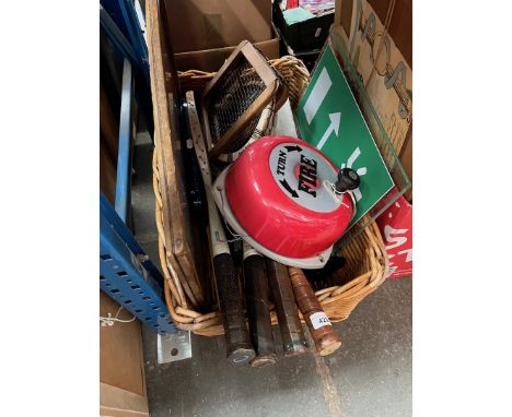 A vintage framed fire warning notice, a fire bell, fire exit signs and other items 