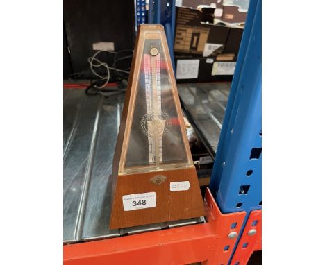 A vintage metronome. 
