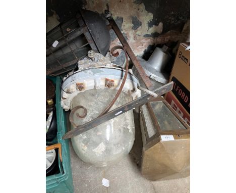 A large industrial safety light fitting, a medium sized safety light fitting and 2 lanterns. 